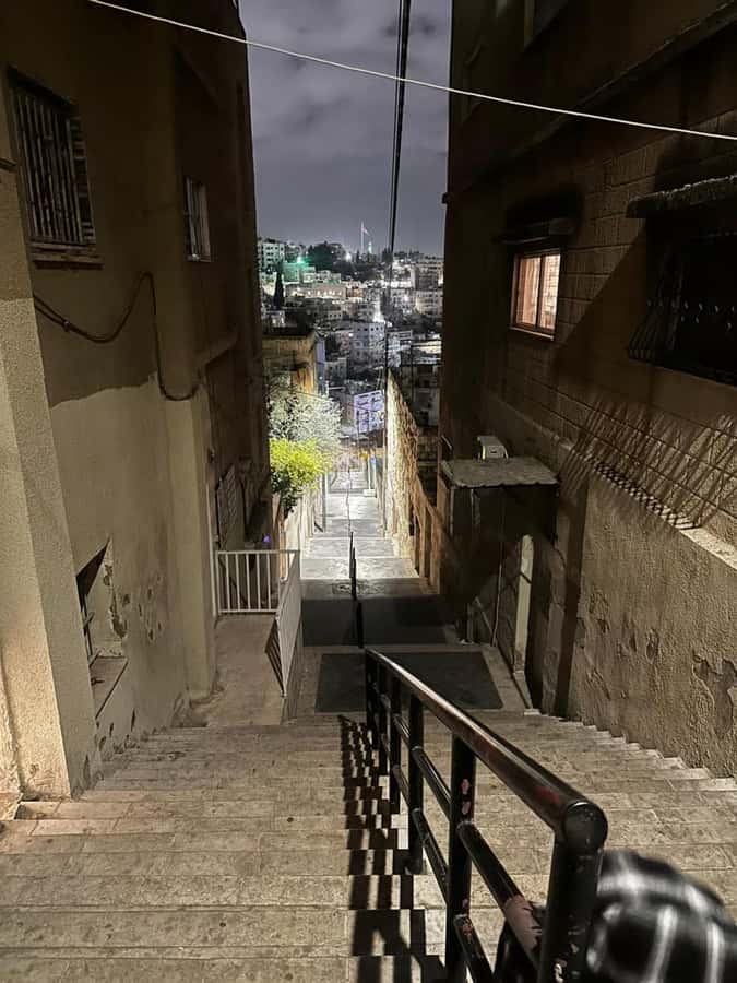 Amman: Culture, History, Tradition & Food Day or Night Tour - Walking downhill into Amman’s oldest center
