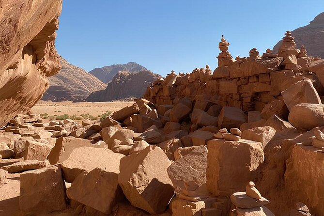 Discover Wadi Rum by 4x4 with a Bedouin guide - Um Ishrin’s canyon walls and ancient inscriptions