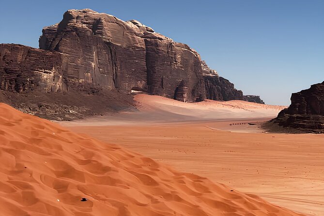 Discover Wadi Rum by 4x4 with a Bedouin guide - Climbing Al Ramal’s red sand dune