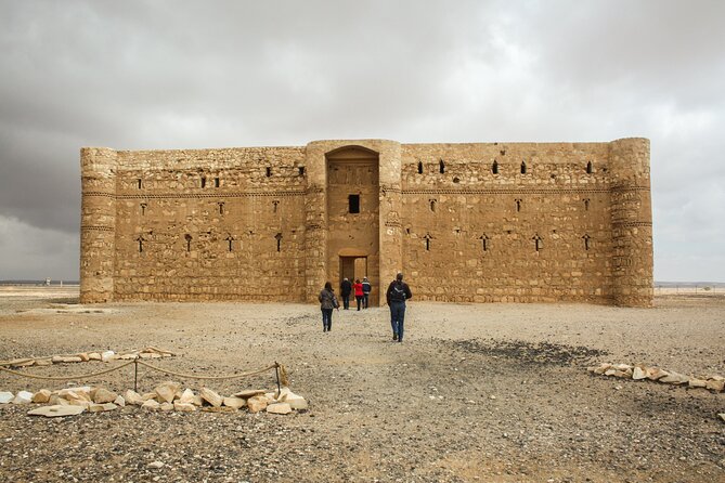 From Amman: Full-Day Tour to Amman City and Desert Castles - Azraq Castle: dark stone and a different mood