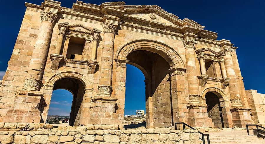 From Amman: Private Half-Day Tour to Jerash - Entering Jerash through the ancient gate