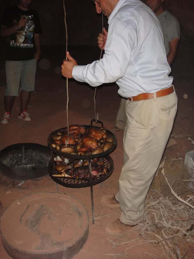 From Wadi Rum: Jeep Tour with Overnight Desert Camping - Sand-cooked dinner, Bedouin tea, and the evening fire