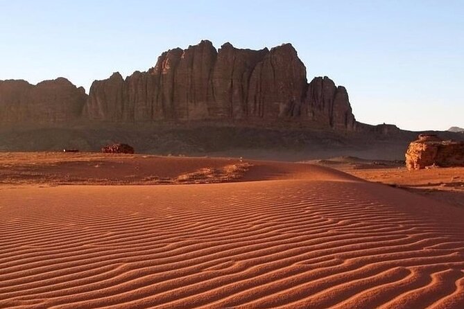 Full-Day Jeep Tour in Wadi Rum with Overnight Stay - Khazali Canyon and centuries of markings