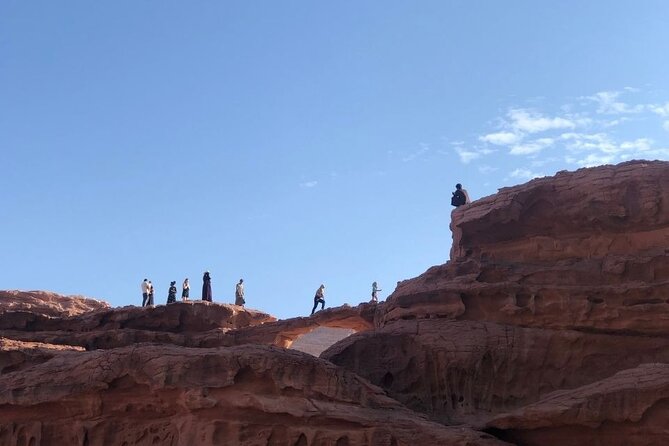 Full Day Jeep Tour & Traditional Lunch - Wadi Rum Desert Highlights - Ancient markings inside Khazali Canyon