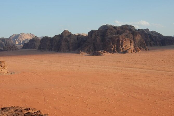 Full-Day Jeep Tour, Wadi Rum Desert Highlights - Red dunes, barefoot walking, and sandboarding