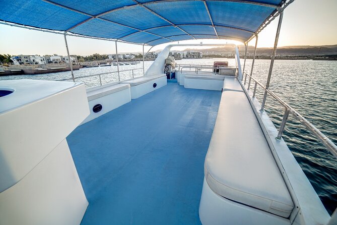 Glass-Bottom Boat 2-hours Tour and Coral-Reef Viewing from Aqaba - Aqaba from the water: castle, palace, and border views