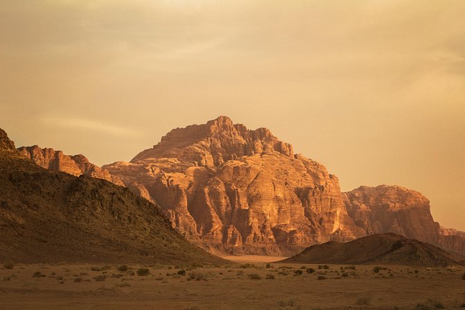 Private Full Day Trip to Wadi Rum Valley of Moon Martian Desert from Amman - First sight of Wadi Rum’s red cliffs