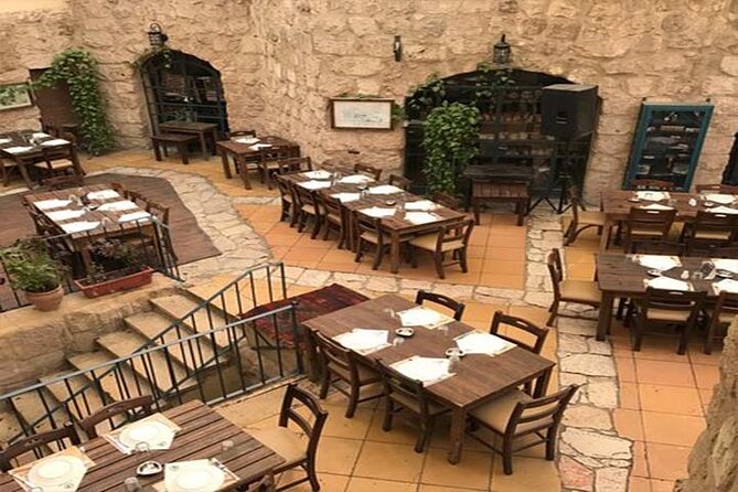 Private Madaba Haret Jdoudna Restaurant Lunch or Dinner from Amman - Entering Haret Jdoudna in historic Madaba