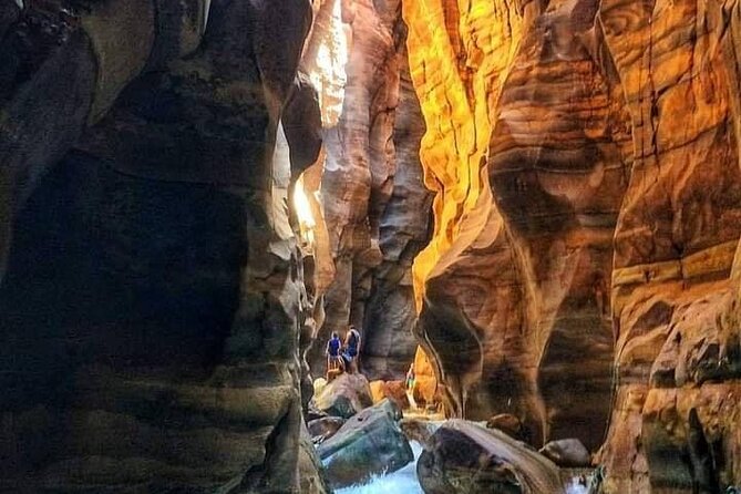 Wadi Al Mujib Adventures From Amman, QAI Airport, Deadsea or Madaba - Walking through red rock and blue pools