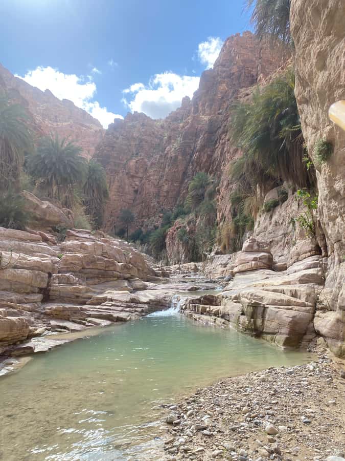 Wadi Ghuweir Full-Day Hike with Local Guide & Lunch. - Walking beside the stream