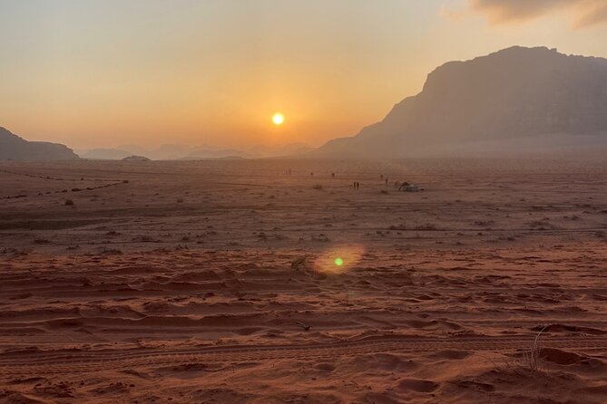 Wadi Rum 4-Hour Sunset Tour - Wadi Rum Desert Highlights - Khazali Canyon and marks left by earlier journeys