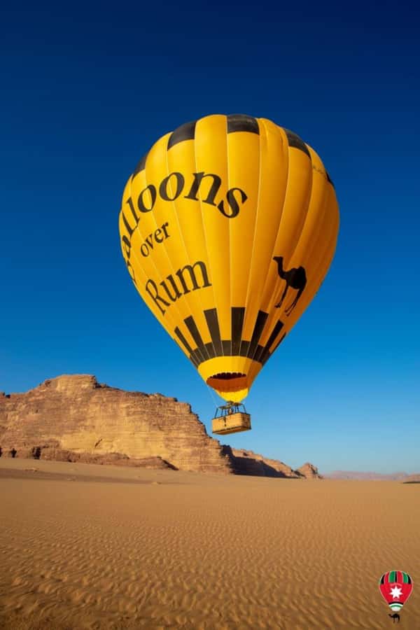 Wadi Rum: Balloons Over Rum - Sunrise over the red sandstone cliffs