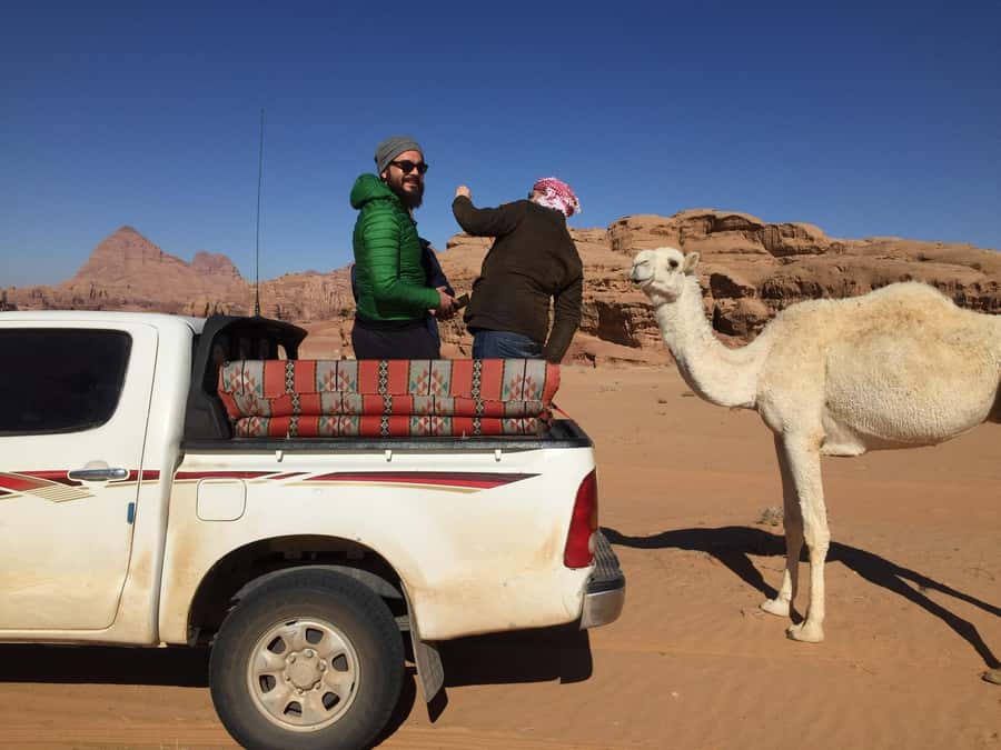 Wadi Rum: Bedouin Camp Stay,Full-Day Desert Tour with 3Meals - Meeting your guide in Wadi Rum Village