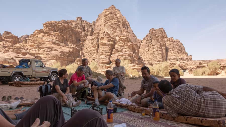 Wadi Rum: Explore 10-Hour Jeep Tour Pass, Guide, Meal & Stay - Stars, firelight, and the Milky Way