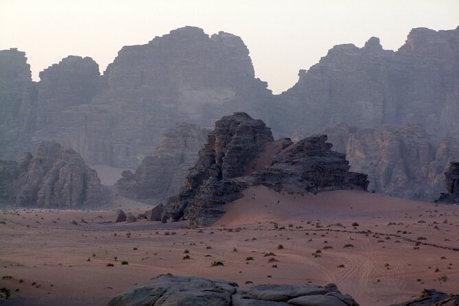 Wadi Rum: Explorer Jeep Tour PASS + Local Food + Optional Stay - Um Frouth Arch and the Cow Rock photo stop