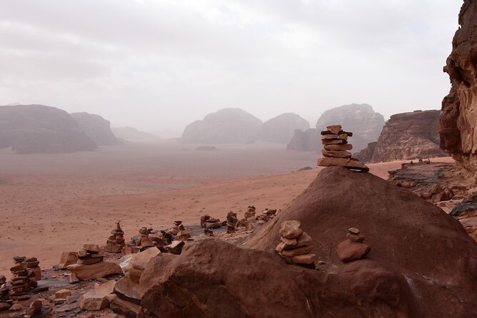 Wadi Rum: Explorer Jeep Tour PASS + Local Food + Optional Stay - Lawrence’s Spring and the first red-dune views