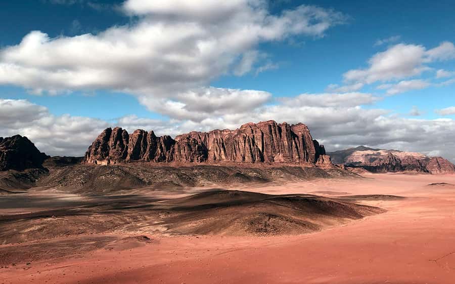 Wadi Rum:Full Day Tour Lunch Sand boarding Camel Ride Sunset - Umm Fruth Rock Bridge and the short climb