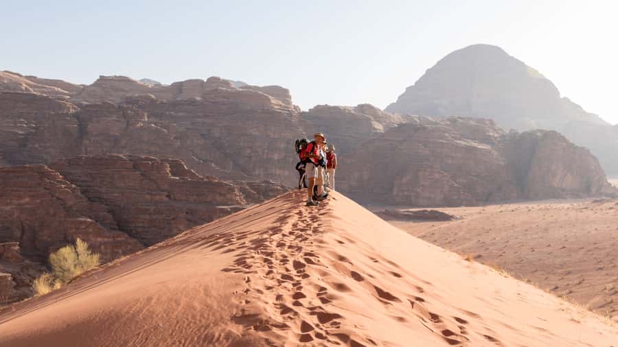 Wadi Rum: Guided Jeep Tour With Overnight Stay and Meals - Lawrence’s Spring and the first desert views